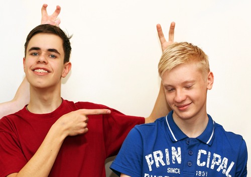 boys with braces posing for a photo